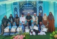 Wabup tanjung jabung saat menghadiri acara pelepasan siswa-siswi Madrasah Tsanawiyah dan Madrasah Aliyah Pondok Pesantren Fathul Ulum di Kelurahan Tebing Tinggi